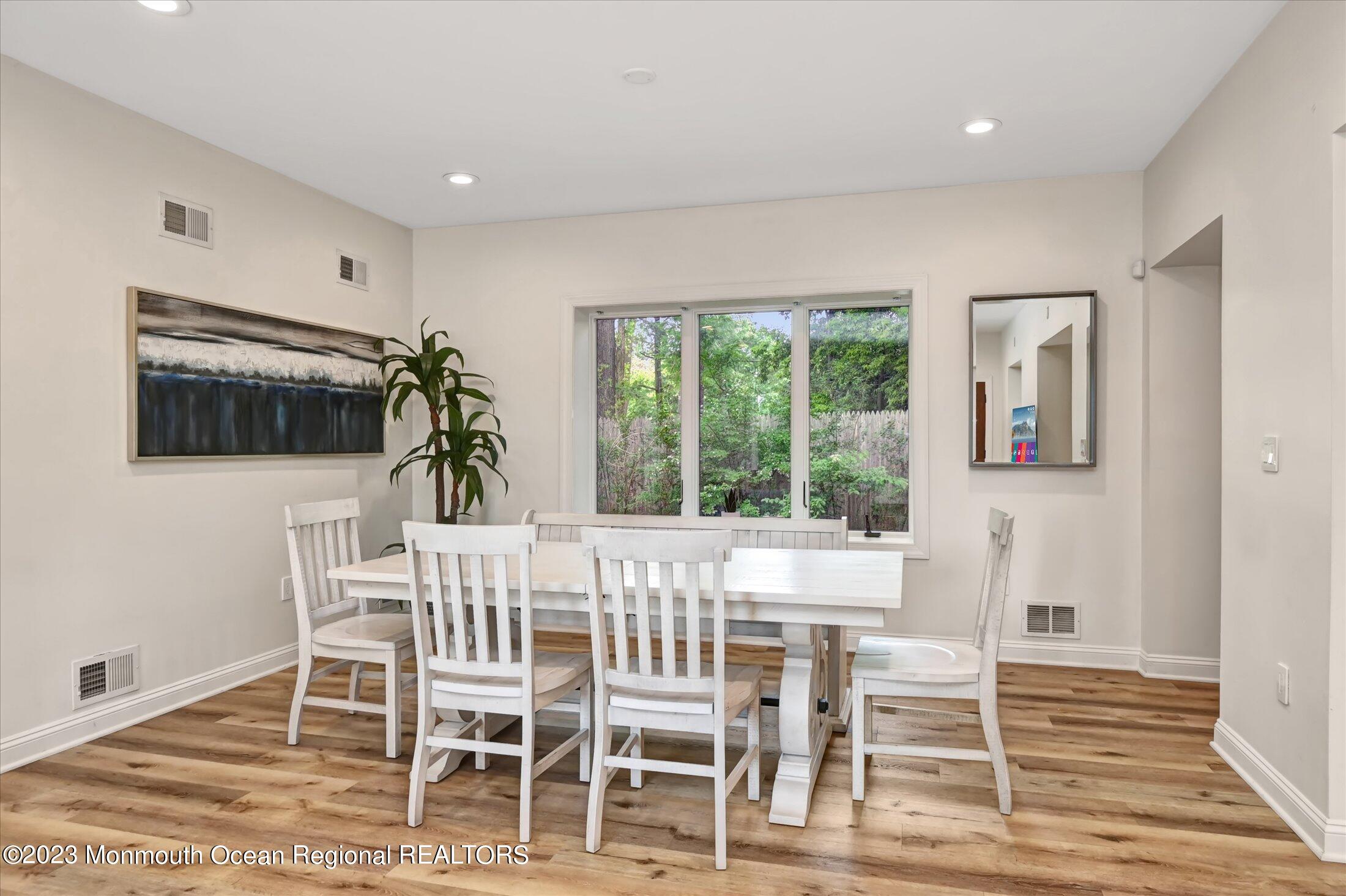 67 Phalanx Road Lincroft, NJ 07738 - Photo 44 of 55 a dining room with furniture and window
