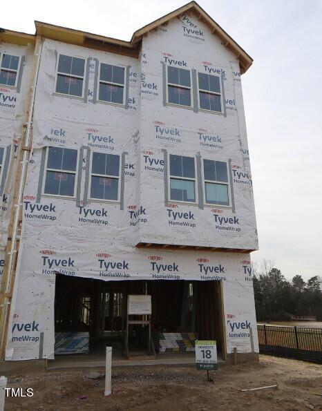 100 Pipers Place Wake Forest, NC 27587 - Photo 1 of 1 a front view of a building with entryway