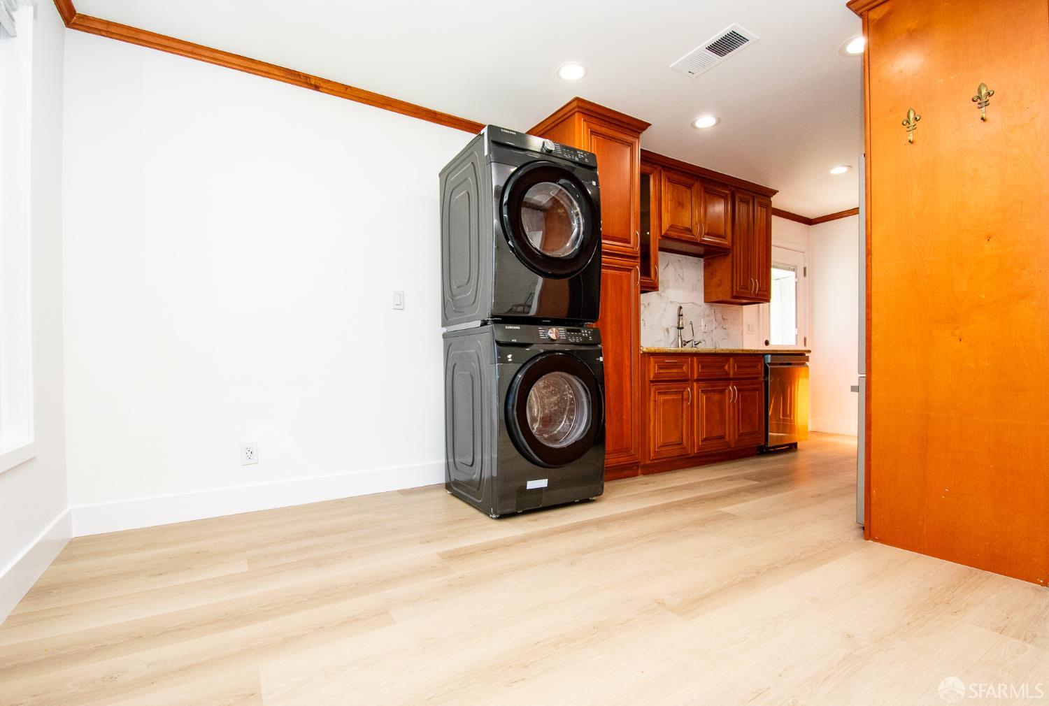 1099 Bradford Drive, Unit A Sunnyvale, CA 94089 - Photo 3 of 16 a view of a storage & utility room with washer and dryer
