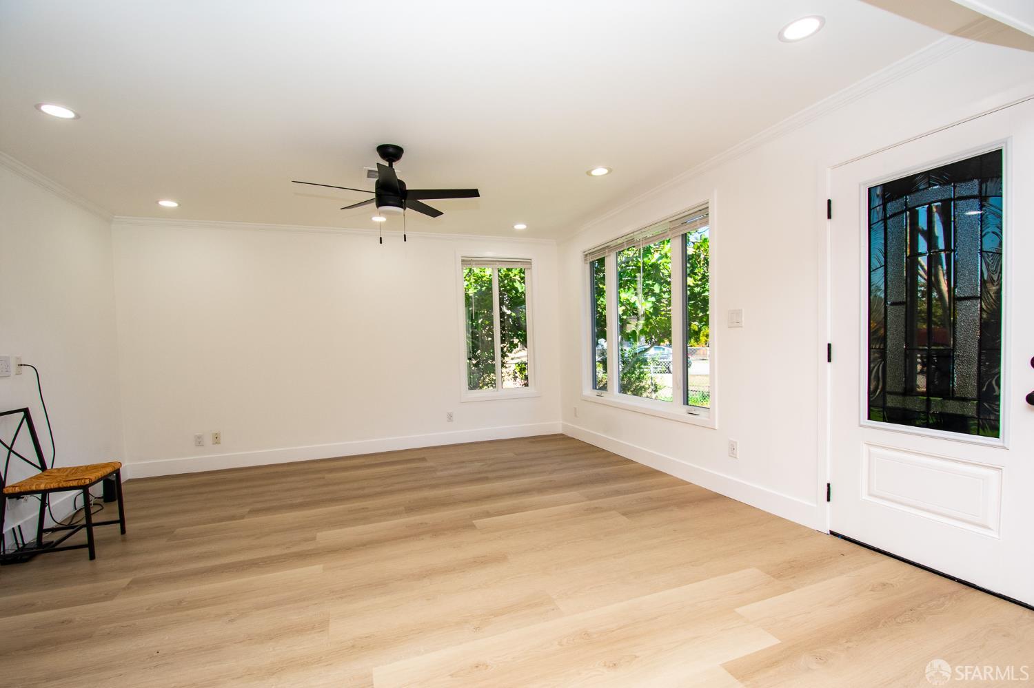 1099 Bradford Drive, Unit A Sunnyvale, CA 94089 - Photo 5 of 16 an empty room with windows and natural light