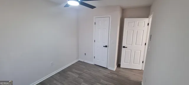 a kitchen with stainless steel appliances a refrigerator and a stove top oven