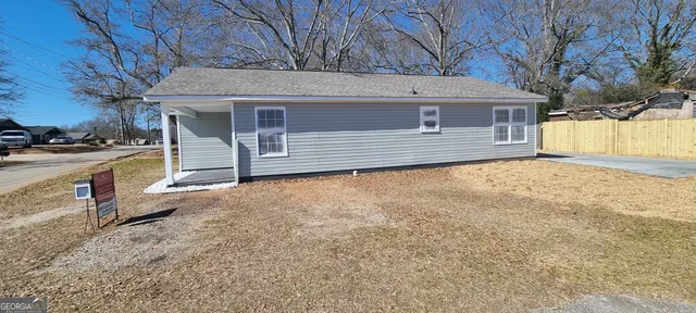 a front view of a house with a garage