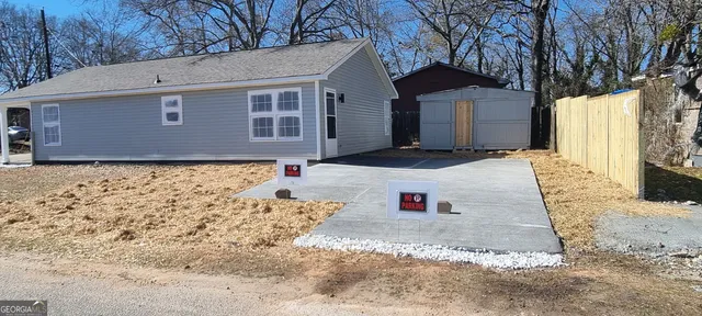 a house view with a outdoor space