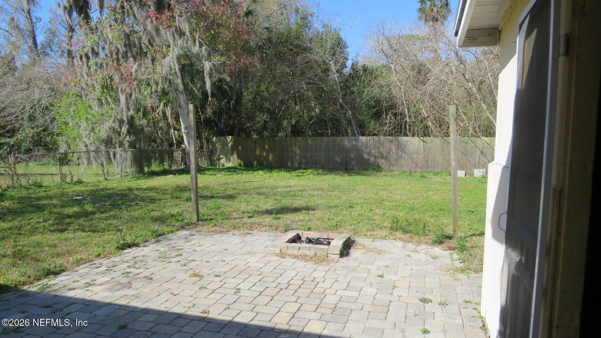 3412 Brockway Road Jacksonville, FL 32250 - Photo 15 of 16 a view of a backyard with a trampoline
