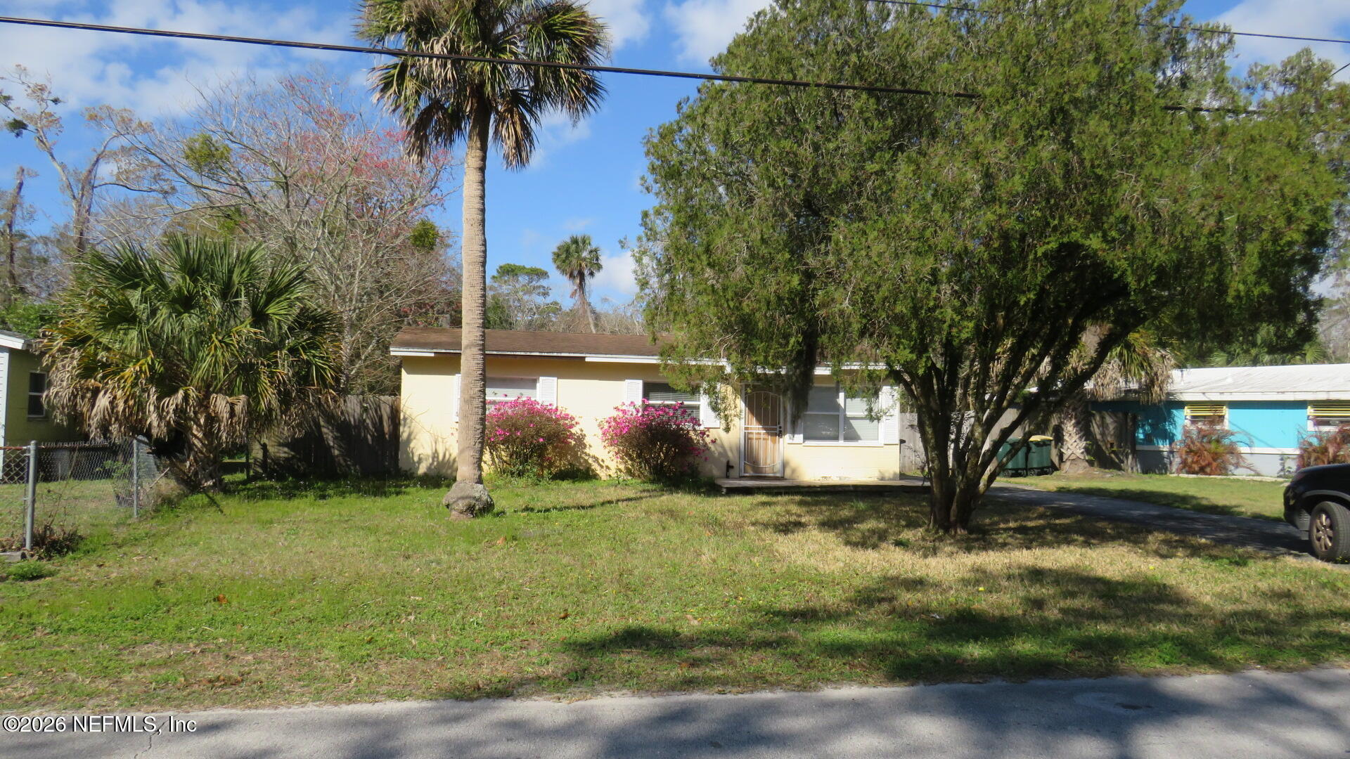 3412 Brockway Road Jacksonville, FL 32250 - Photo 2 of 16 a view of a yard with cars