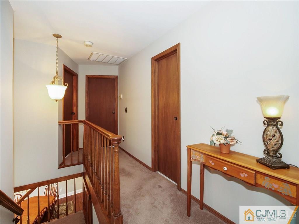 13 Stiles Road Edison, NJ 08817 - Photo 13 of 24 a view of a hallway with front door