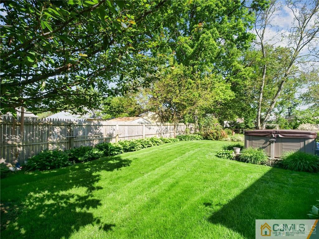 13 Stiles Road Edison, NJ 08817 - Photo 21 of 24 a view of a house with a yard