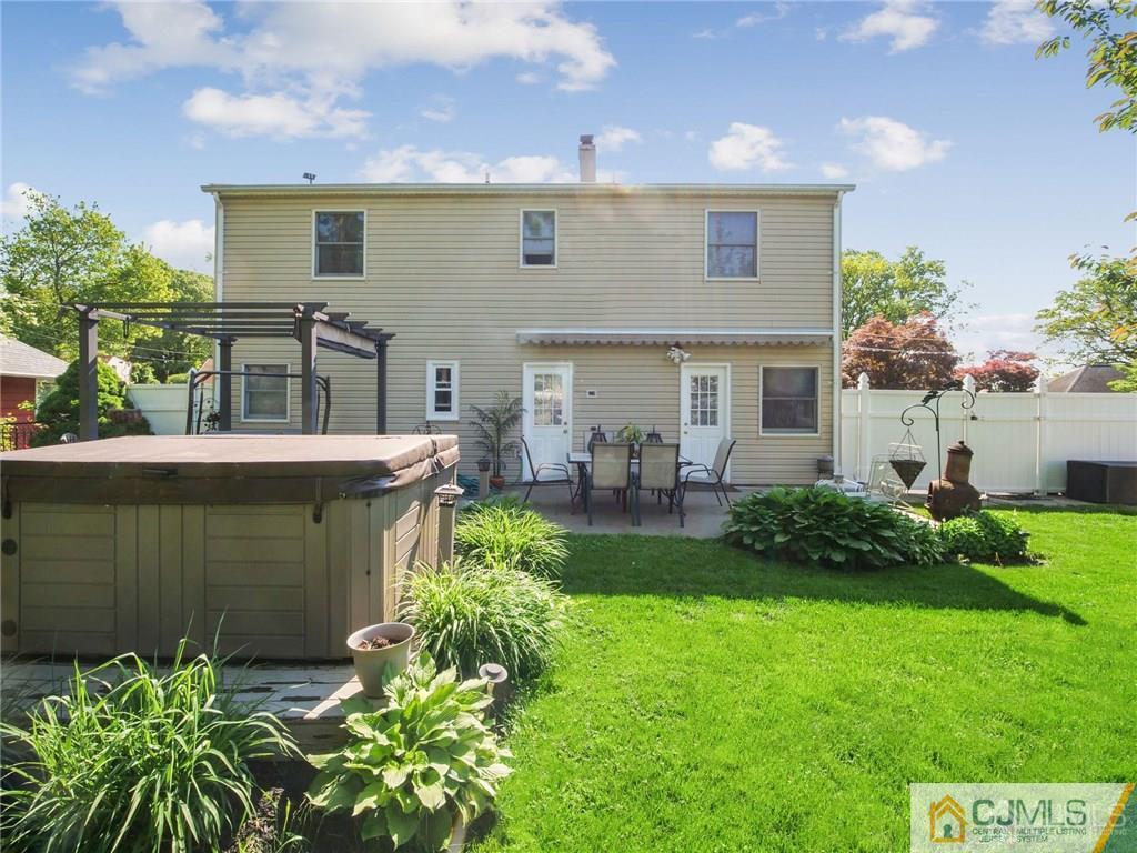 13 Stiles Road Edison, NJ 08817 - Photo 23 of 24 a view of a house with a backyard