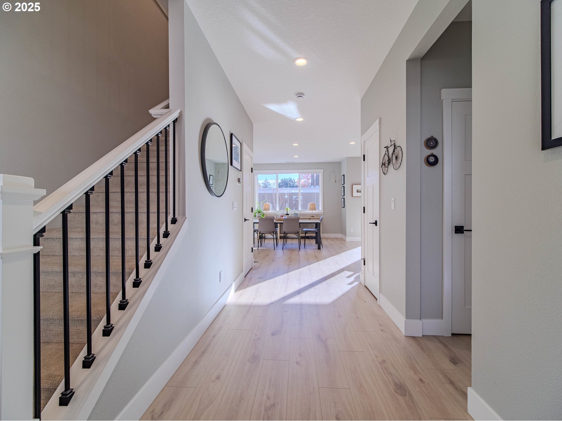 8588 Summit Court Portland, OR 97225 - Photo 3 of 22 a view of entryway and hall with wooden floor