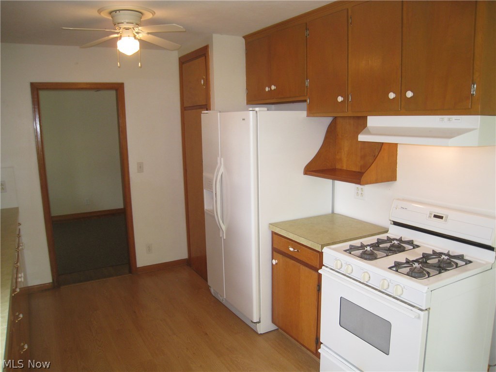 Plenty of storage, including a pantry in the Kitchen.