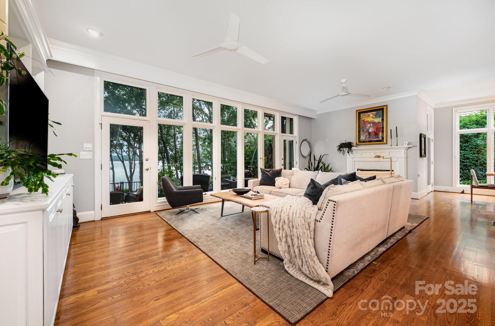 16133 North Point Road Huntersville, NC 28078 - Photo 14 of 48 a large white bed sitting in a living room next to a window