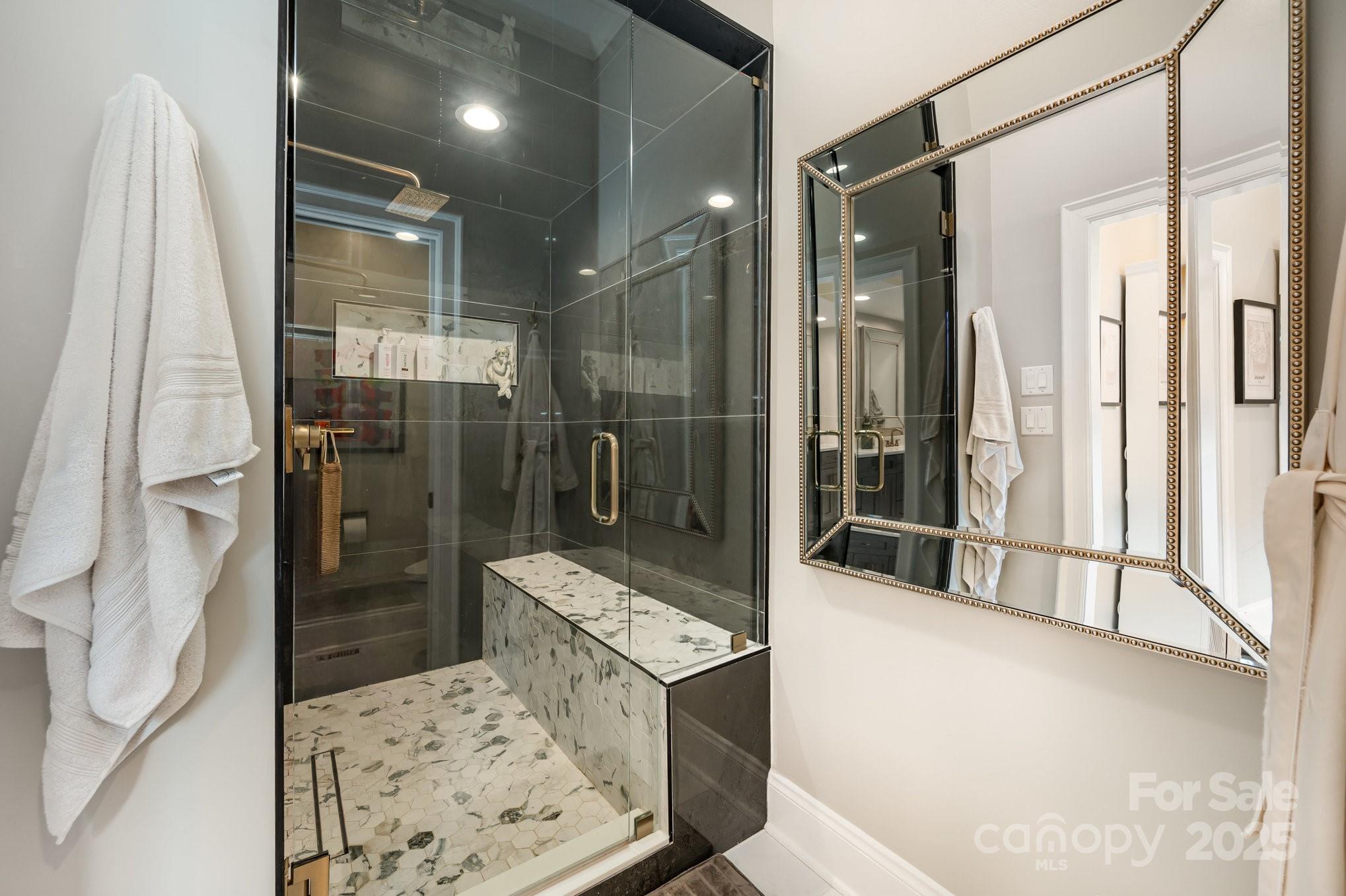 16133 North Point Road Huntersville, NC 28078 - Photo 23 of 48 a bathroom with a shower and a sink