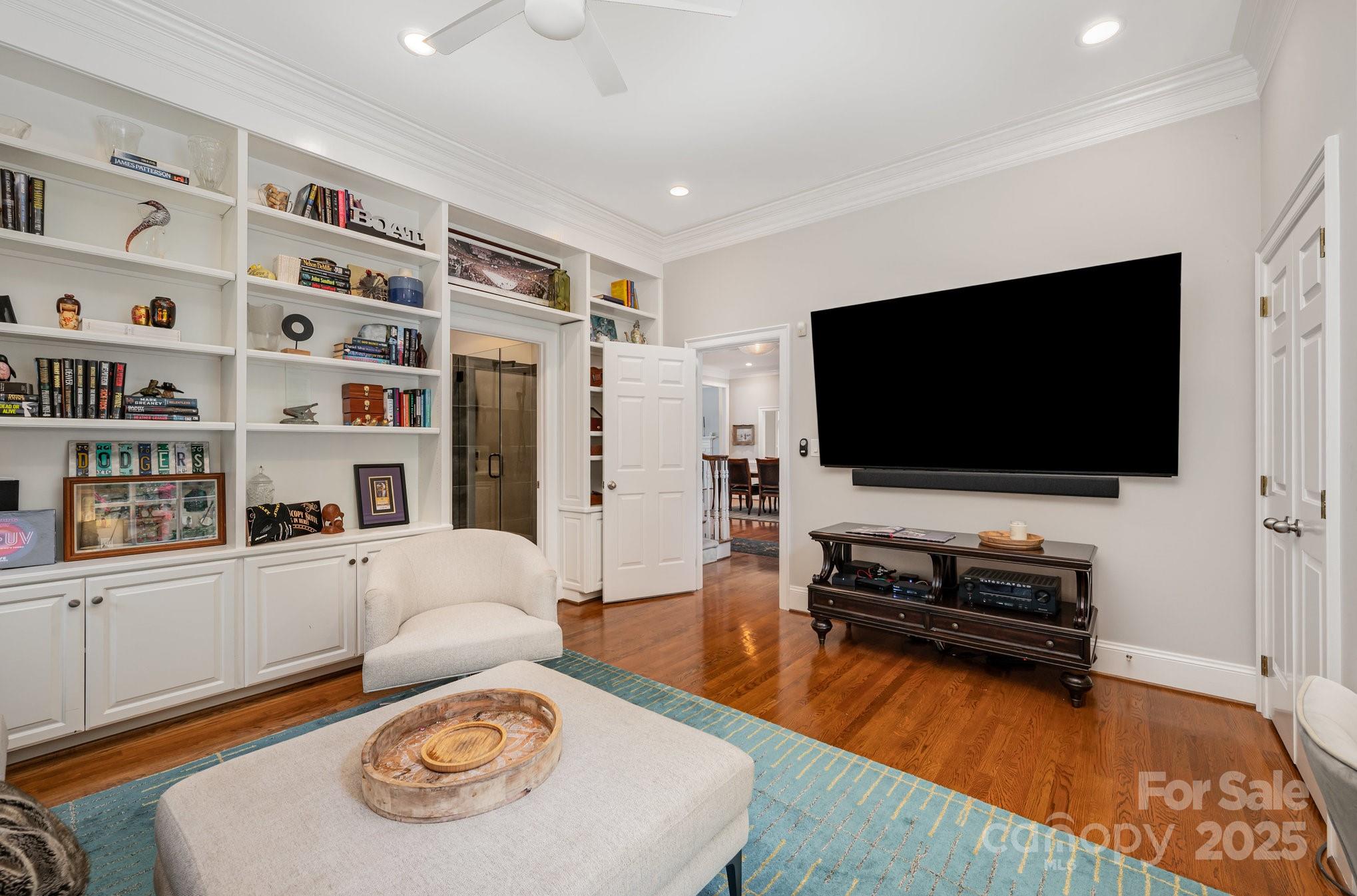 16133 North Point Road Huntersville, NC 28078 - Photo 26 of 48 a living room with furniture and a flat screen tv