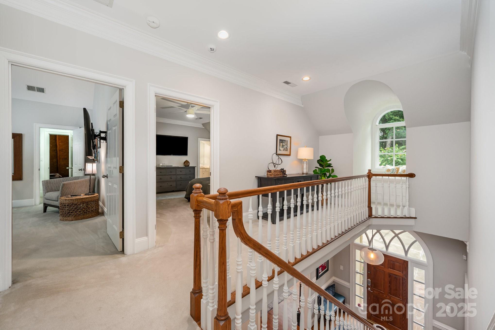 16133 North Point Road Huntersville, NC 28078 - Photo 31 of 48 a view of staircase with furniture and a window