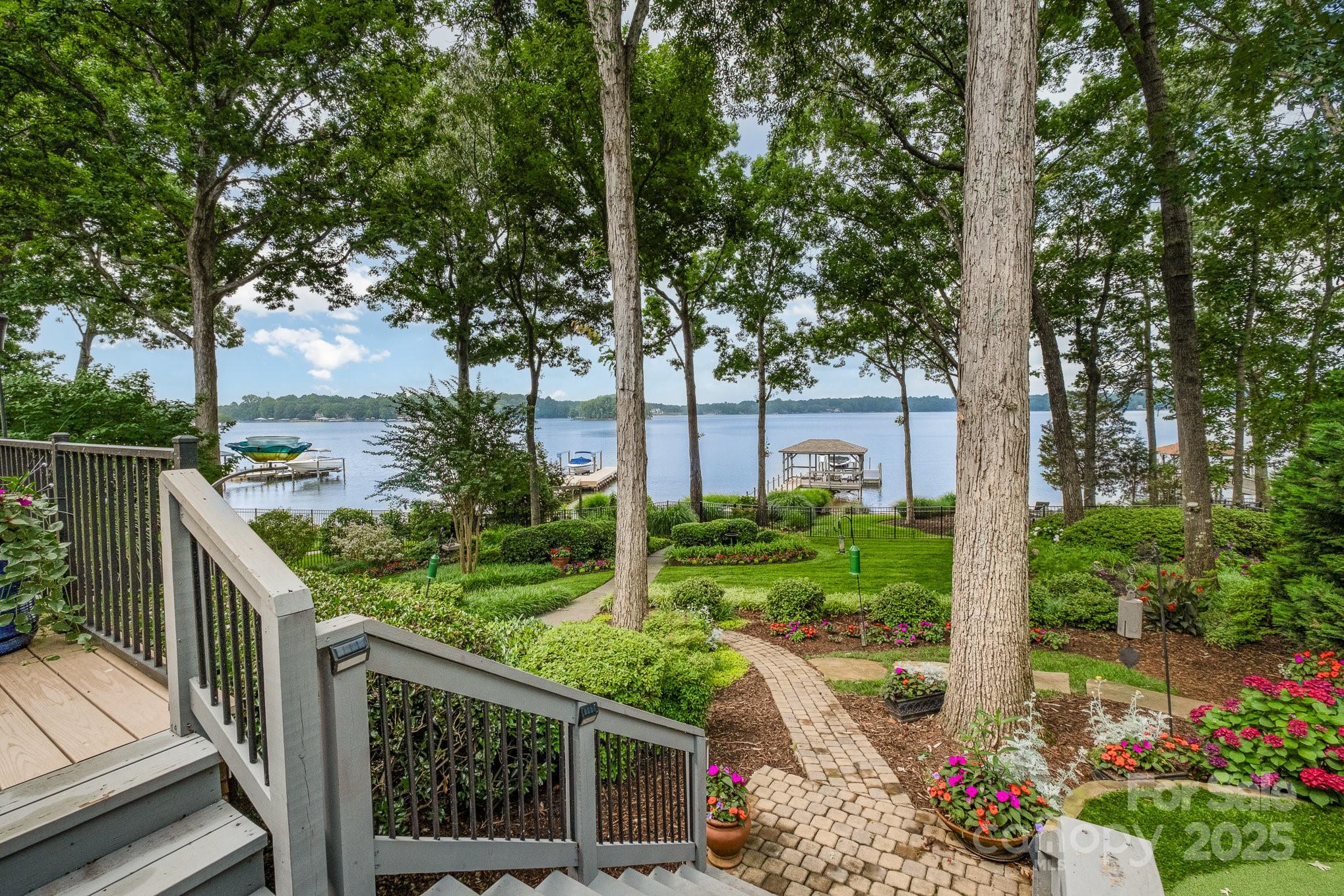 16133 North Point Road Huntersville, NC 28078 - Photo 40 of 48 a front view of a house with garden