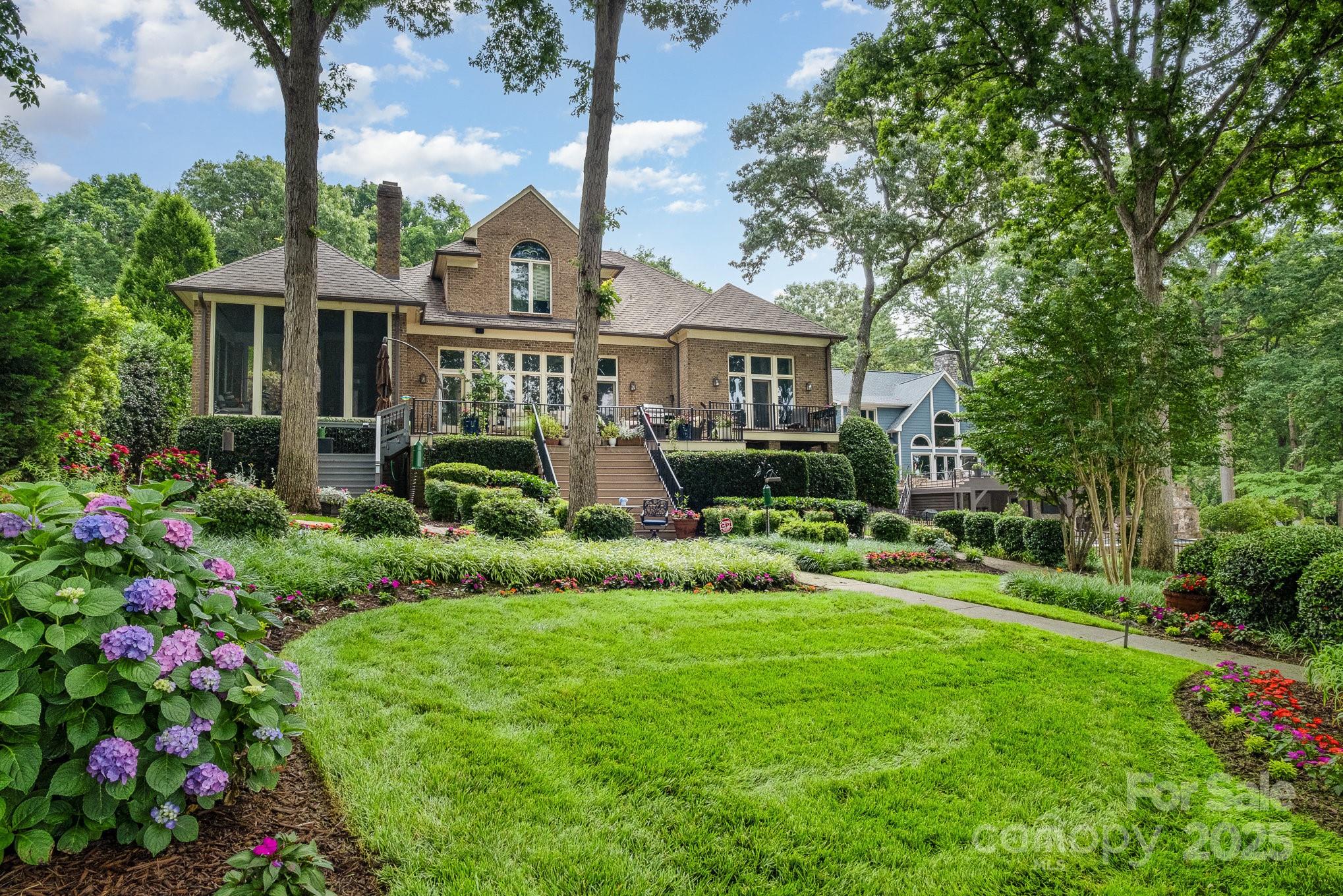 16133 North Point Road Huntersville, NC 28078 - Photo 41 of 48 a front view of house with yard and green space