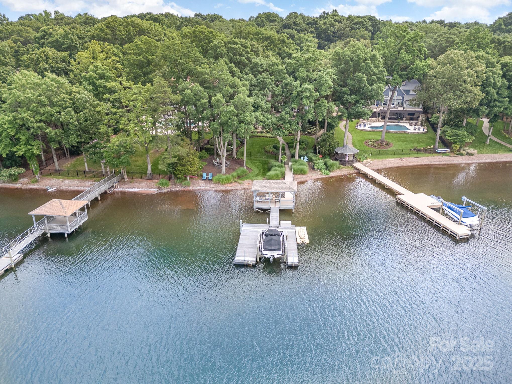 16133 North Point Road Huntersville, NC 28078 - Photo 46 of 48 a view of a lake with a park
