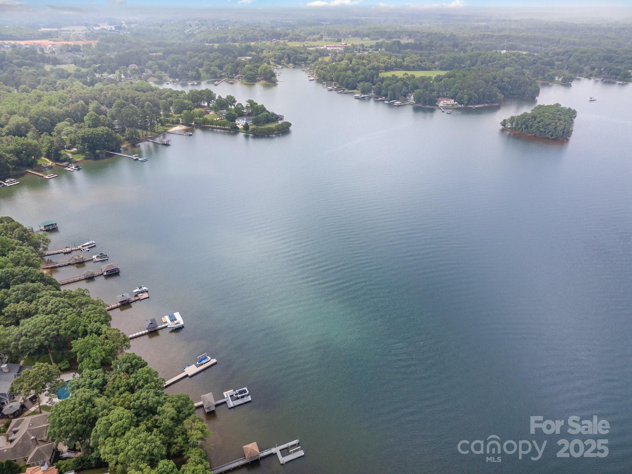 16133 North Point Road Huntersville, NC 28078 - Photo 48 of 48 an aerial view of a houses with ocean view