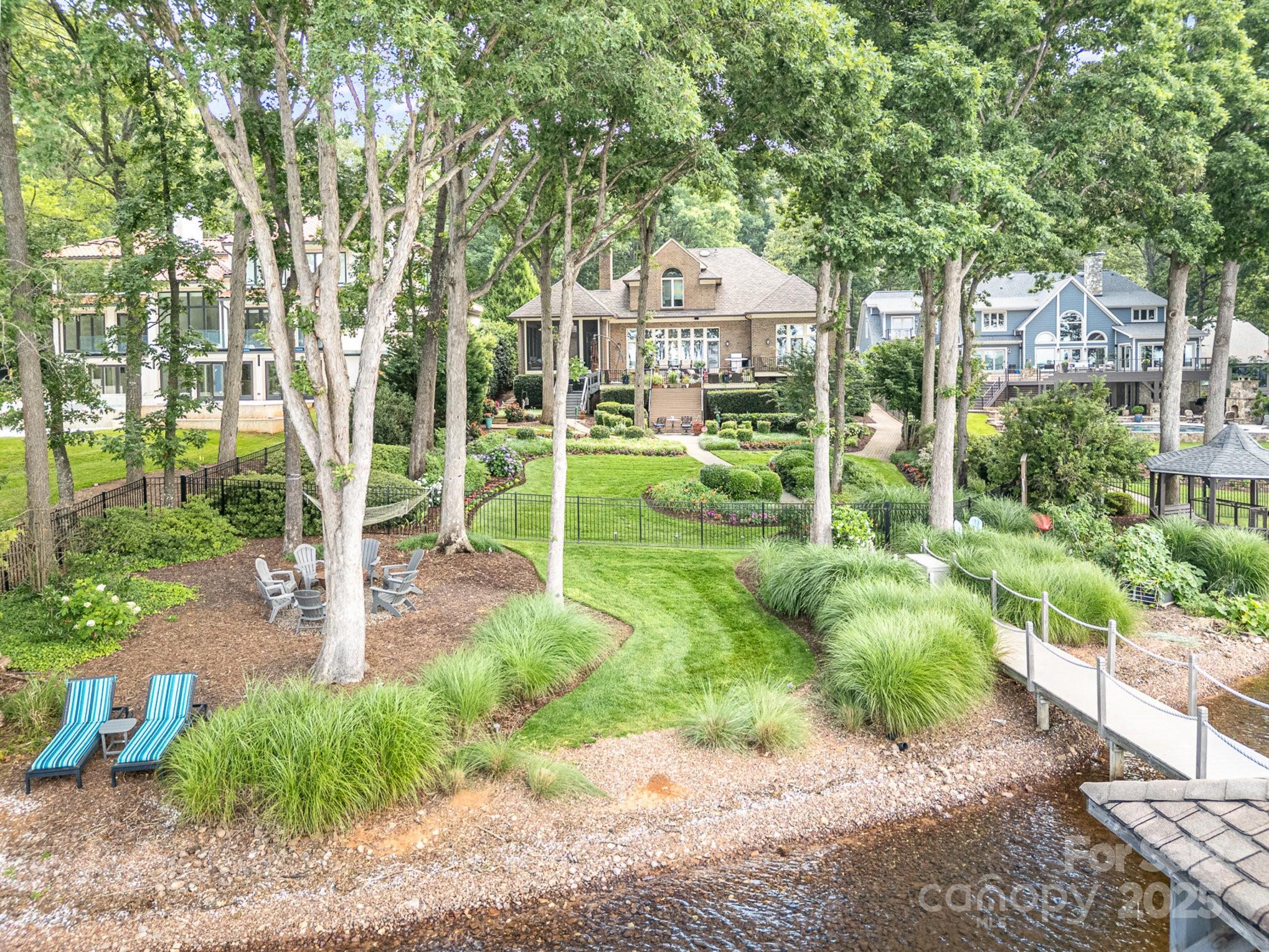 16133 North Point Road Huntersville, NC 28078 - Photo 8 of 48 a view of a garden with a fountain