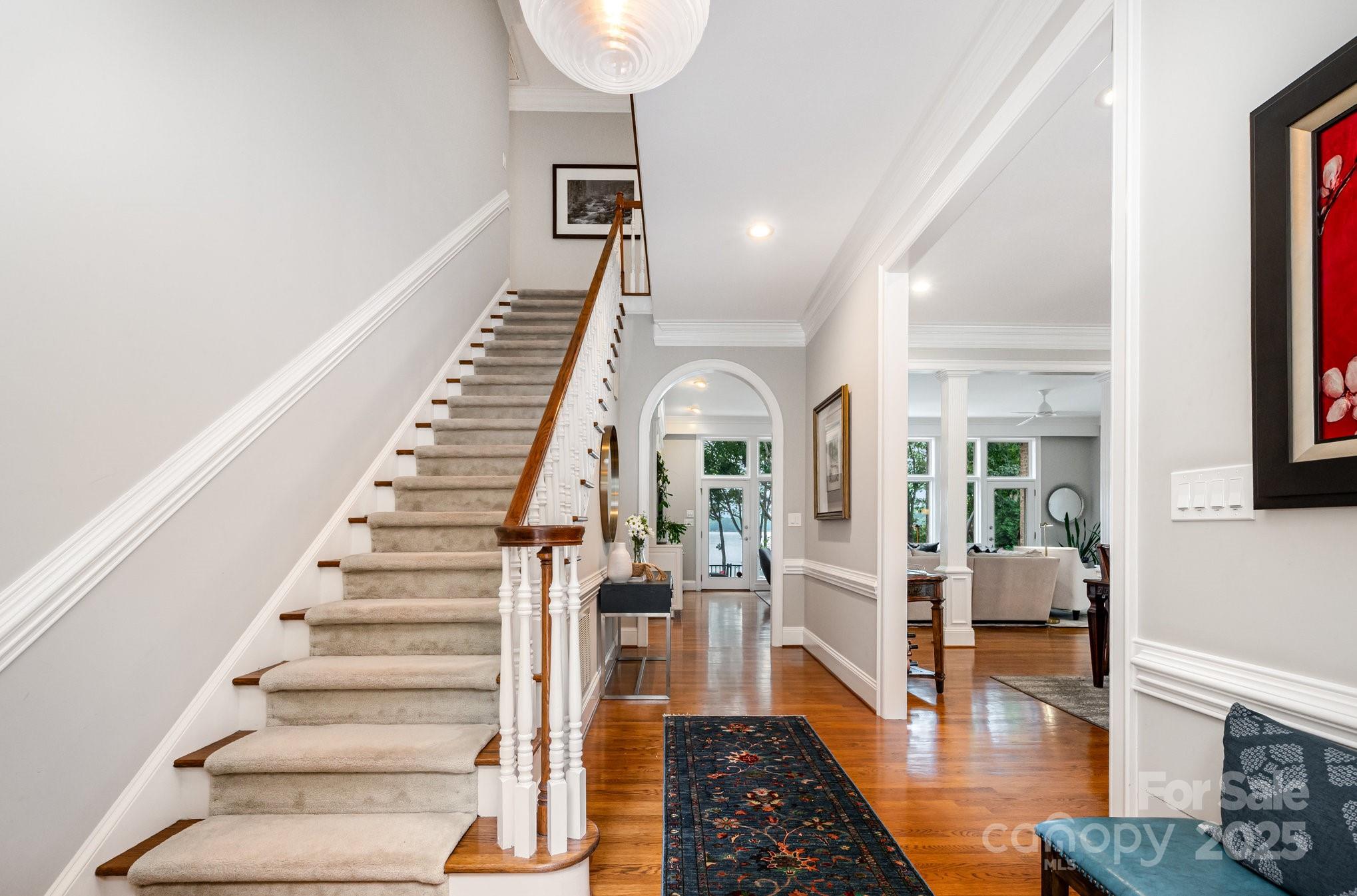 16133 North Point Road Huntersville, NC 28078 - Photo 10 of 48 a view of entryway and hall with wooden floor