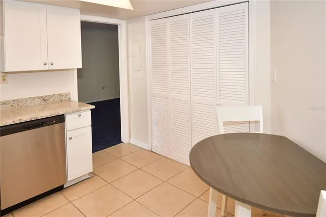 an empty room with a empty space and a ceiling fan