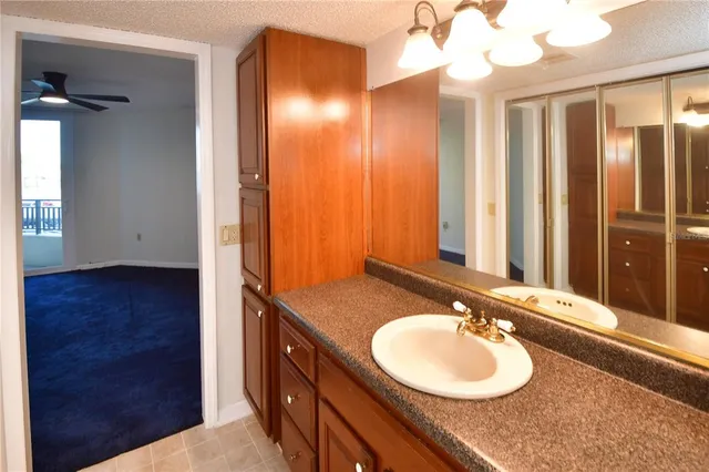 a view of an outside dining space with furniture