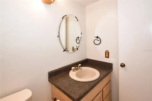 a view of a swimming pool with a chairs