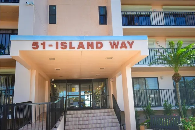 a view of a livingroom with a space and balcony