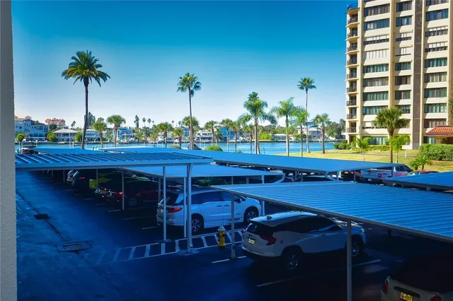 a view of a house with patio and a garden
