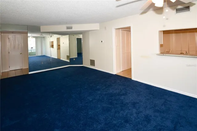 a kitchen with a sink cabinets and utility