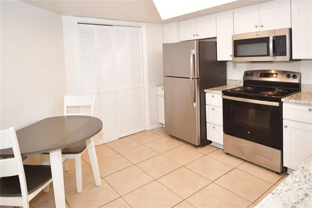 a view of a room with table and chair