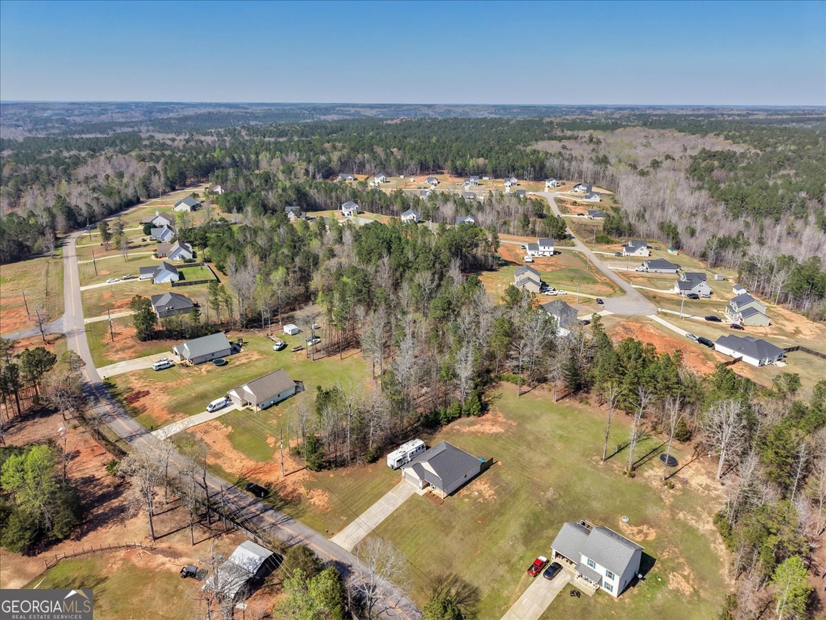 773 Weldon Road Forsyth, GA 31029 - Photo 36 of 37 an aerial view of residential house with outdoor space