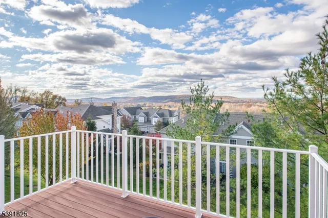 a view of a wooden roof deck