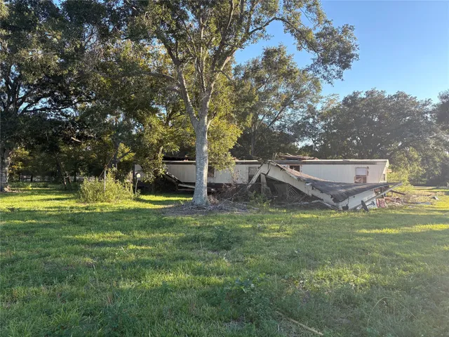 a view of a golf course with a lake view