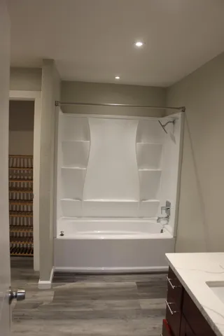 a view of a room with racks on the wall