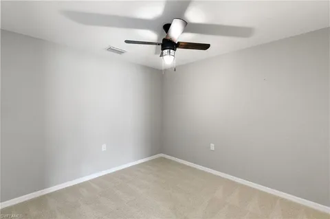 a view of a hallway with washer and dryer
