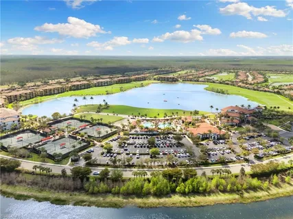 an aerial view of a house with a lake view