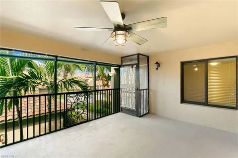 a view of a room with a large window