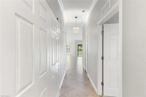a view of a hallway with a white walls