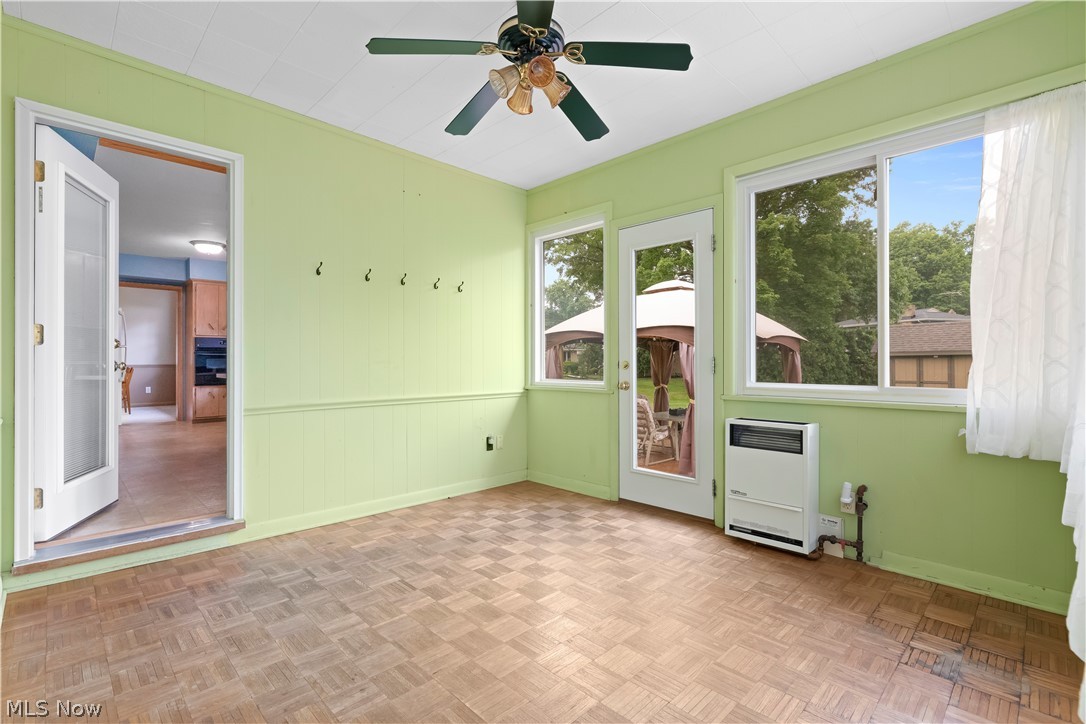 575 Overwood Road Akron, OH 44313 - Photo 15 of 45 Unfurnished sunroom featuring ceiling fan