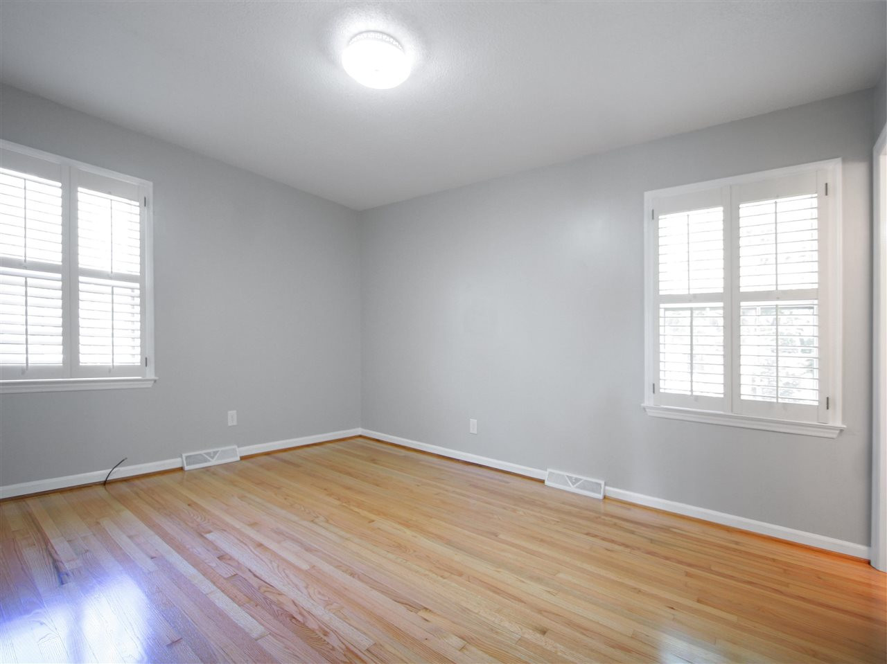 1324 Kingston Ridge Road Cary, NC 27511 - Photo 21 of 30 The owner's suite bedroom is at the back of the home and features windows on two walls. Owner's Suite Bedroom