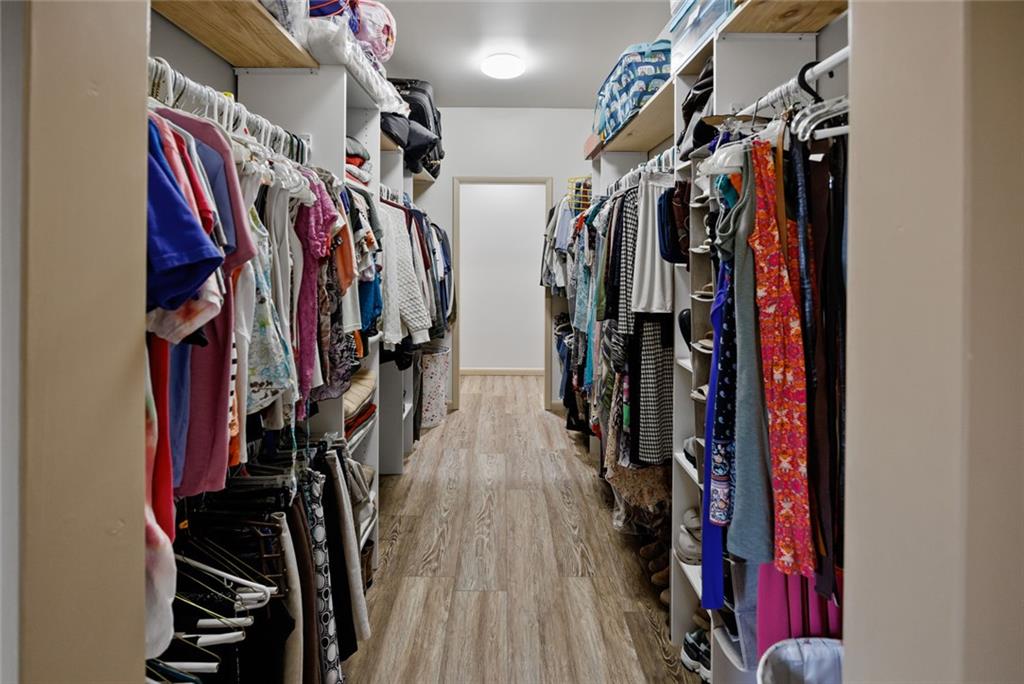 1581 Taylor Town Road Northeast Ranger, GA 30734 - Photo 11 of 37 a view of walk in closet with clothes