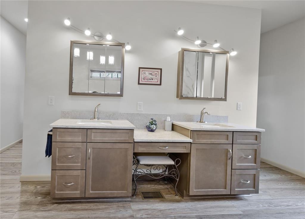 1581 Taylor Town Road Northeast Ranger, GA 30734 - Photo 11 of 30 a bathroom with a sink double vanity and a mirror