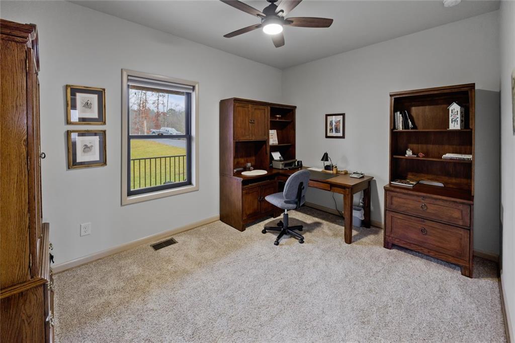 1581 Taylor Town Road Northeast Ranger, GA 30734 - Photo 14 of 37 a view of workspace with wooden floor furniture