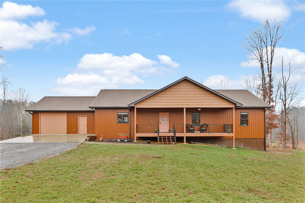 1581 Taylor Town Road Northeast Ranger, GA 30734 - Photo 24 of 30 a front view of house with yard and green space