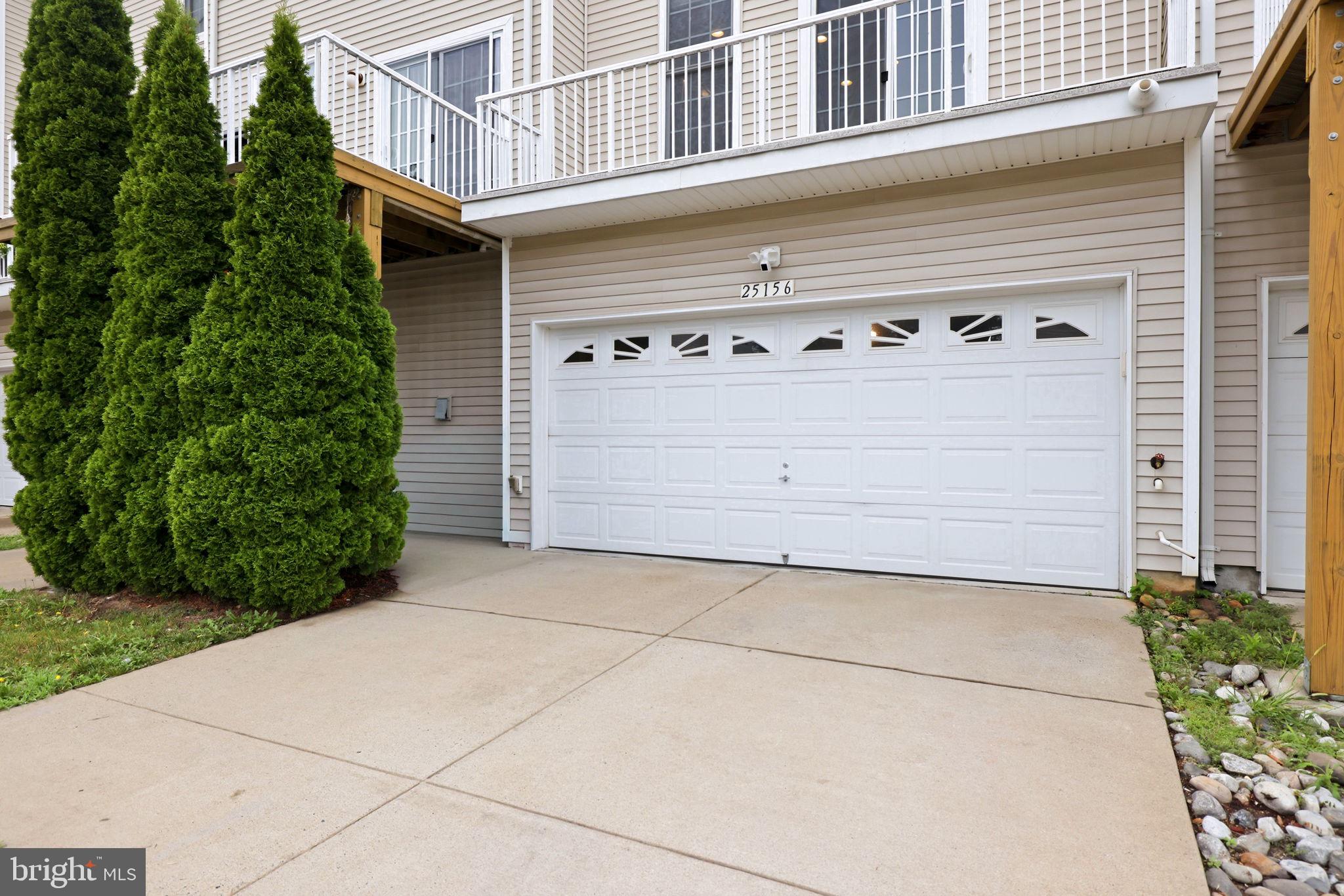 25156 Monteith Terrace Chantilly, VA 20152 - Photo 8 of 72 Charming entrance with lush greenery.