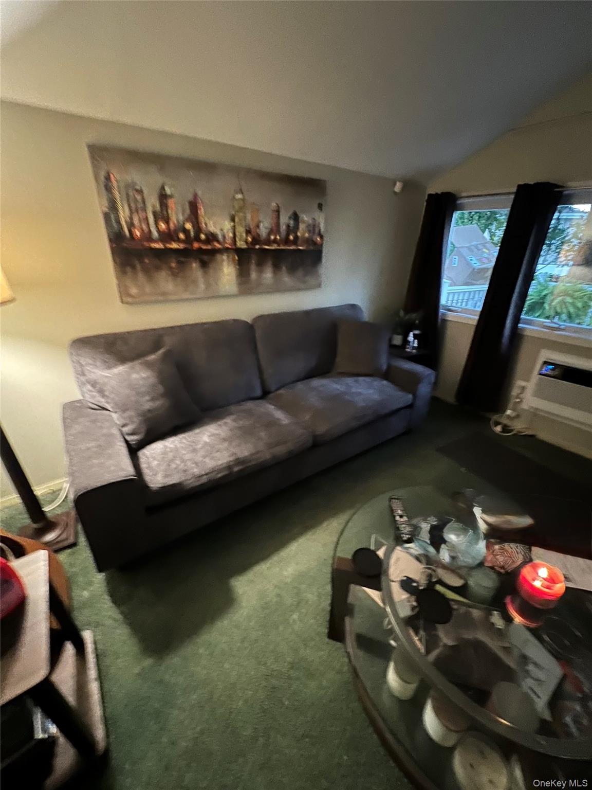 1015 Harding Park Bronx, NY 10473 - Photo 4 of 13 a living room with furniture and a floor to ceiling window