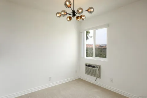 a kitchen with stainless steel appliances a sink stove and refrigerator