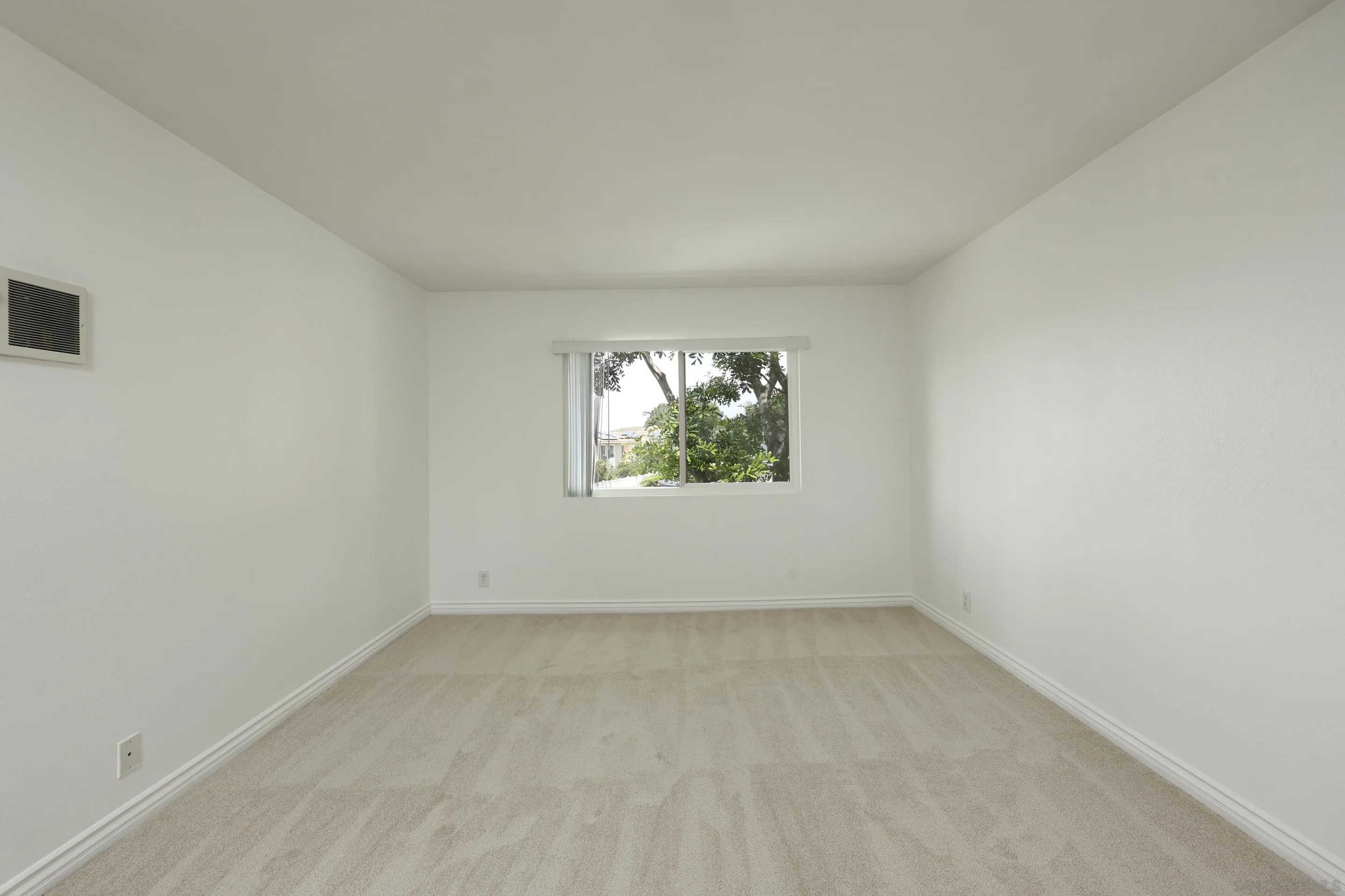 9949 Erma Road, Unit 203 San Diego, CA 92131 - Photo 23 of 43 an empty room with a window