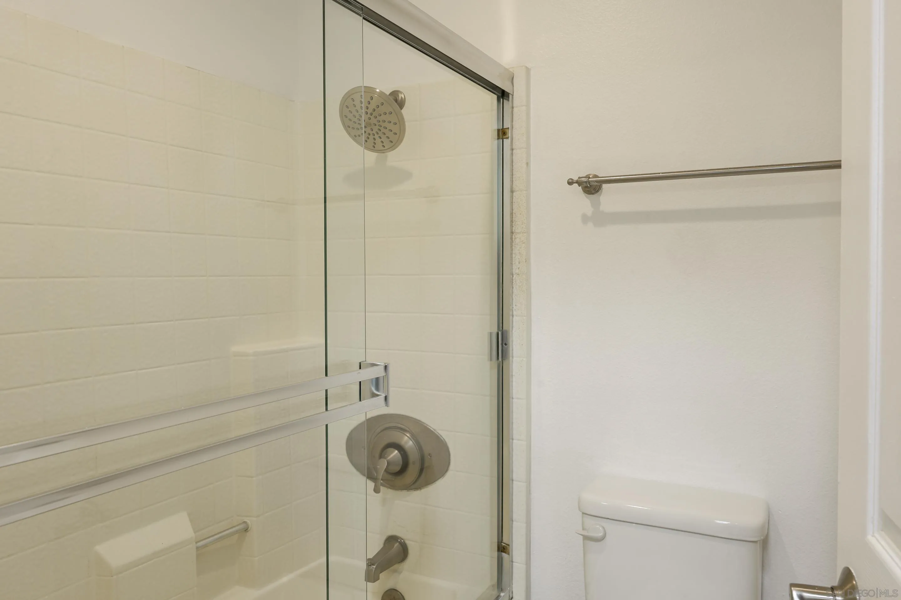 9949 Erma Road, Unit 203 San Diego, CA 92131 - Photo 28 of 43 a bathroom with a shower